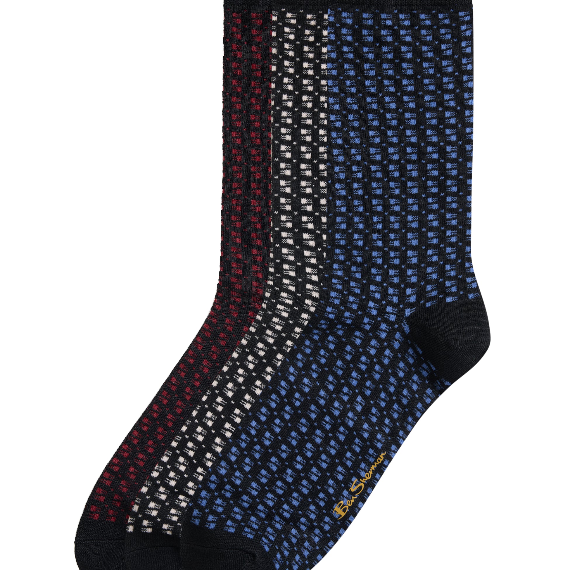Three pairs of crew socks with a small geometric dot pattern, shown overlapping on a white background. The colors are navy blue, dark red, and black.