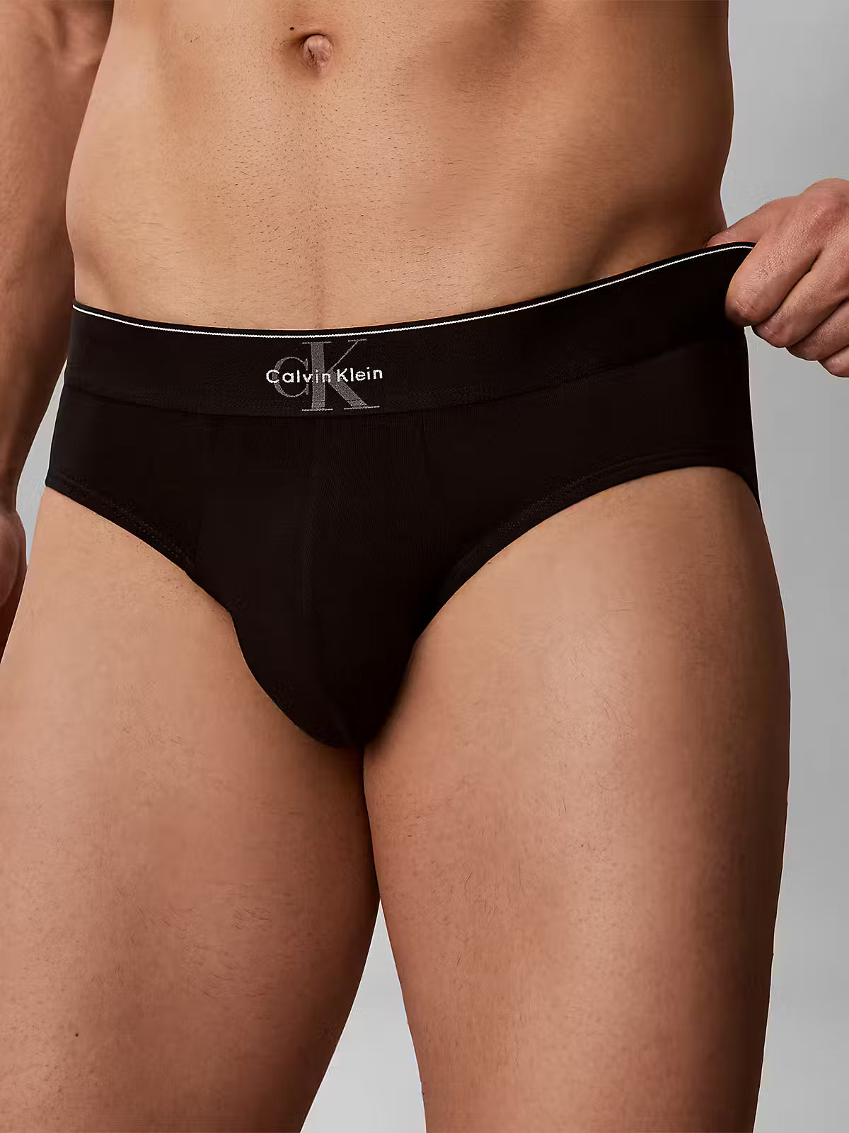 Calvin Klein Graphic Monogram hip briefs - CK waistband and fabric close-up