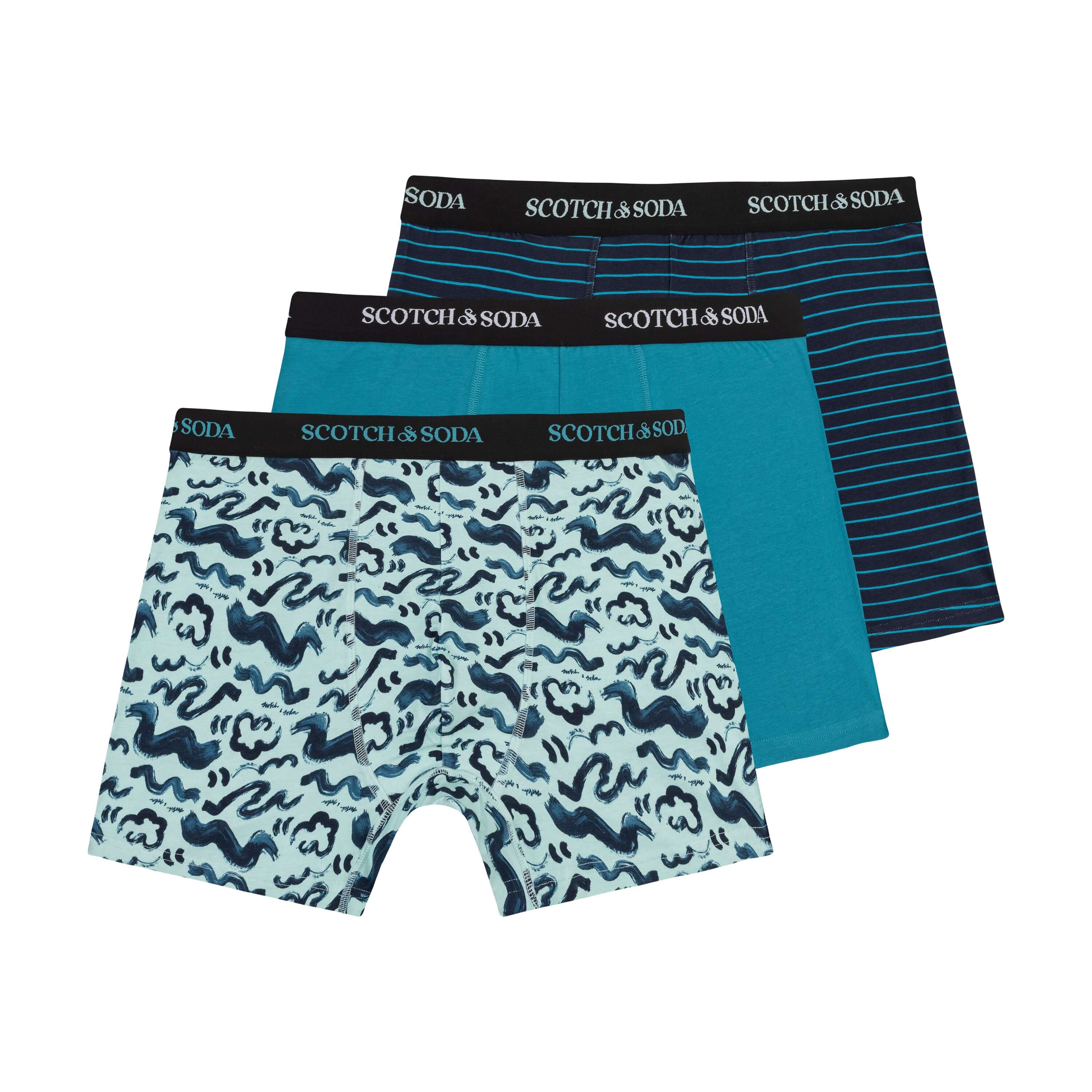 Three pairs of Scotch & Soda boxer briefs in different patterns on a white background