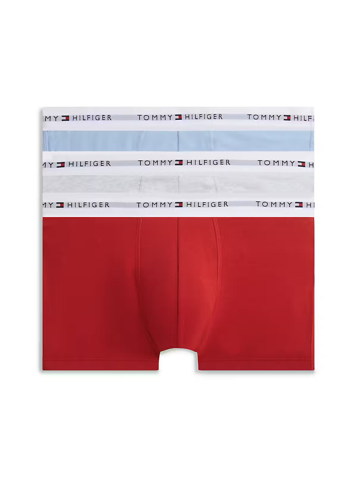 A pair of Tommy Hilfiger men's boxer briefs featuring a distinctive color-blocked design with a solid red lower half and white and light blue upper panels, each with a white waistband printed with the Tommy Hilfiger logo.