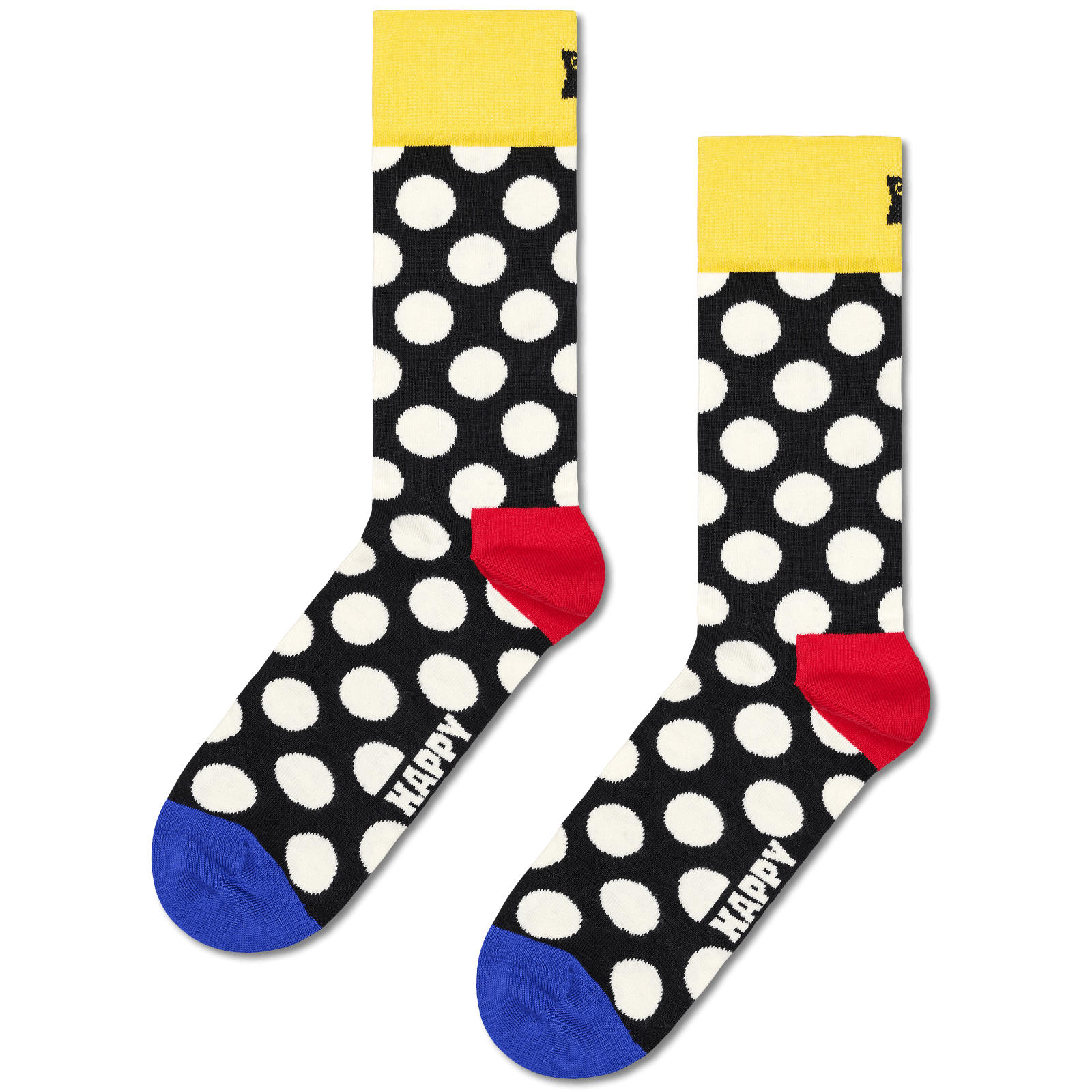 A pair of novelty crew socks with a black background, white polka dots, a bright yellow cuff, a red heel, and a blue toe. The word 'HAPPY' is printed in white on the foot.