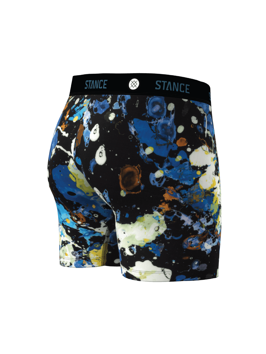 Men's boxer briefs featuring a vibrant blue, white, and black abstract paint splatter pattern, with a black elastic waistband displaying the 'STANCE' brand logo.