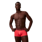 Calvin Klein Intense Power Low Rise Microfibre Trunks – coral front on model