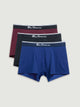 Three pairs of men's underwear with different colored waistbands on a light gray background.
