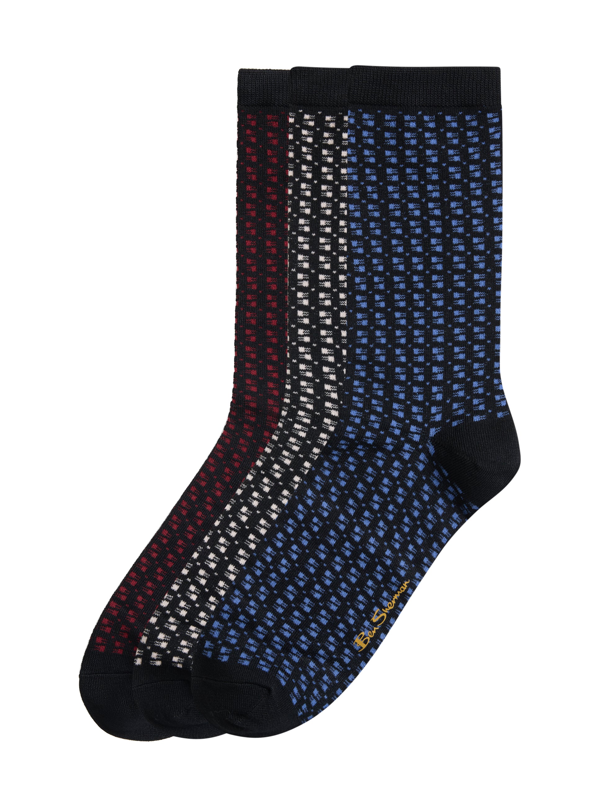 Three pairs of crew socks with a small geometric dot pattern, shown overlapping on a white background. The colors are navy blue, dark red, and black.