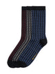Three pairs of crew socks with a small geometric dot pattern, shown overlapping on a white background. The colors are navy blue, dark red, and black.