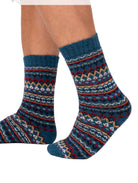 Pair of patterned socks with 'Skandinavisches Buntes Design' text on a white background