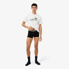 Lacoste 5H1292 black trunks full body lifestyle photograph