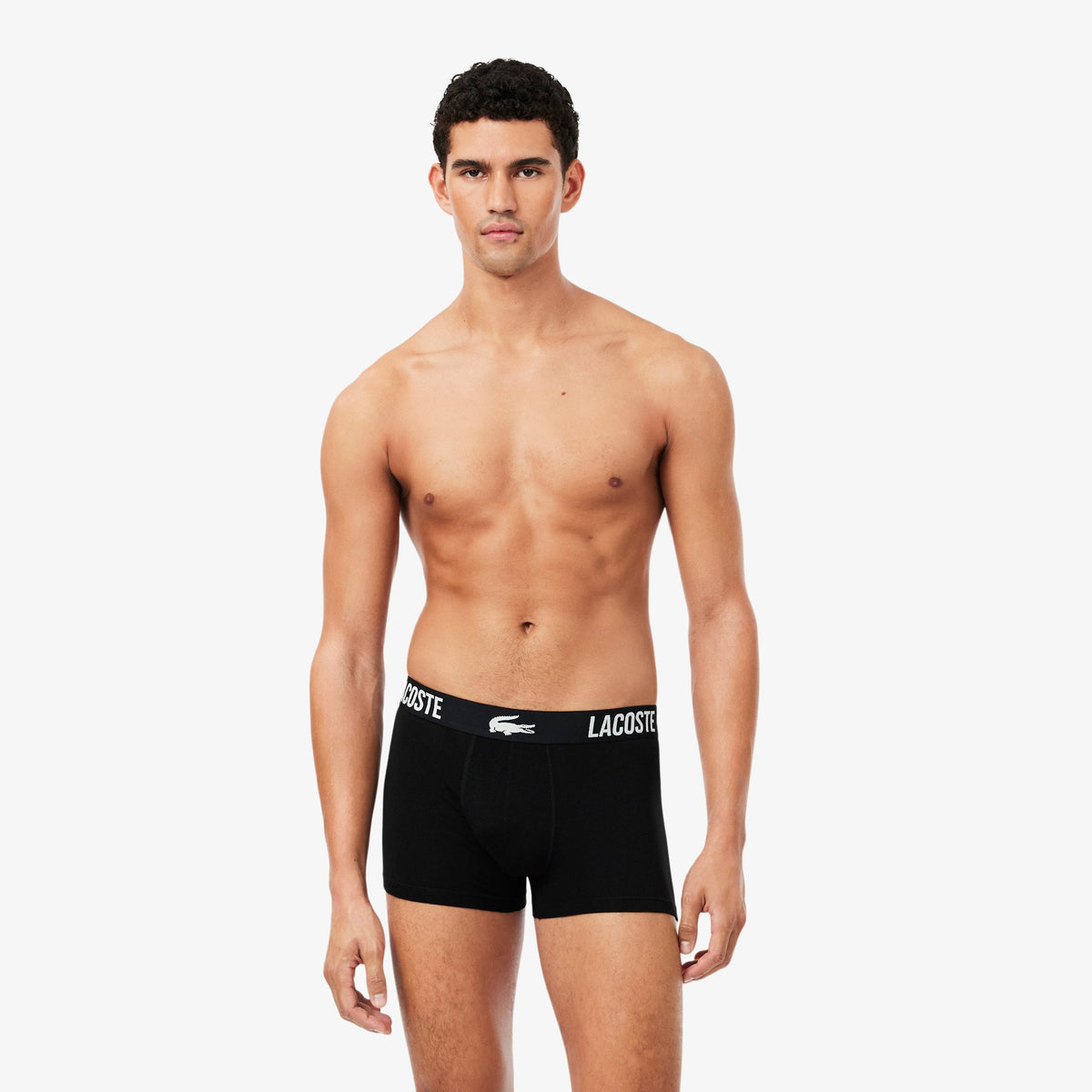 Model wearing Lacoste 5H2393 black logo waistband trunks front