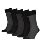 Set of black and gray patterned socks on a white background