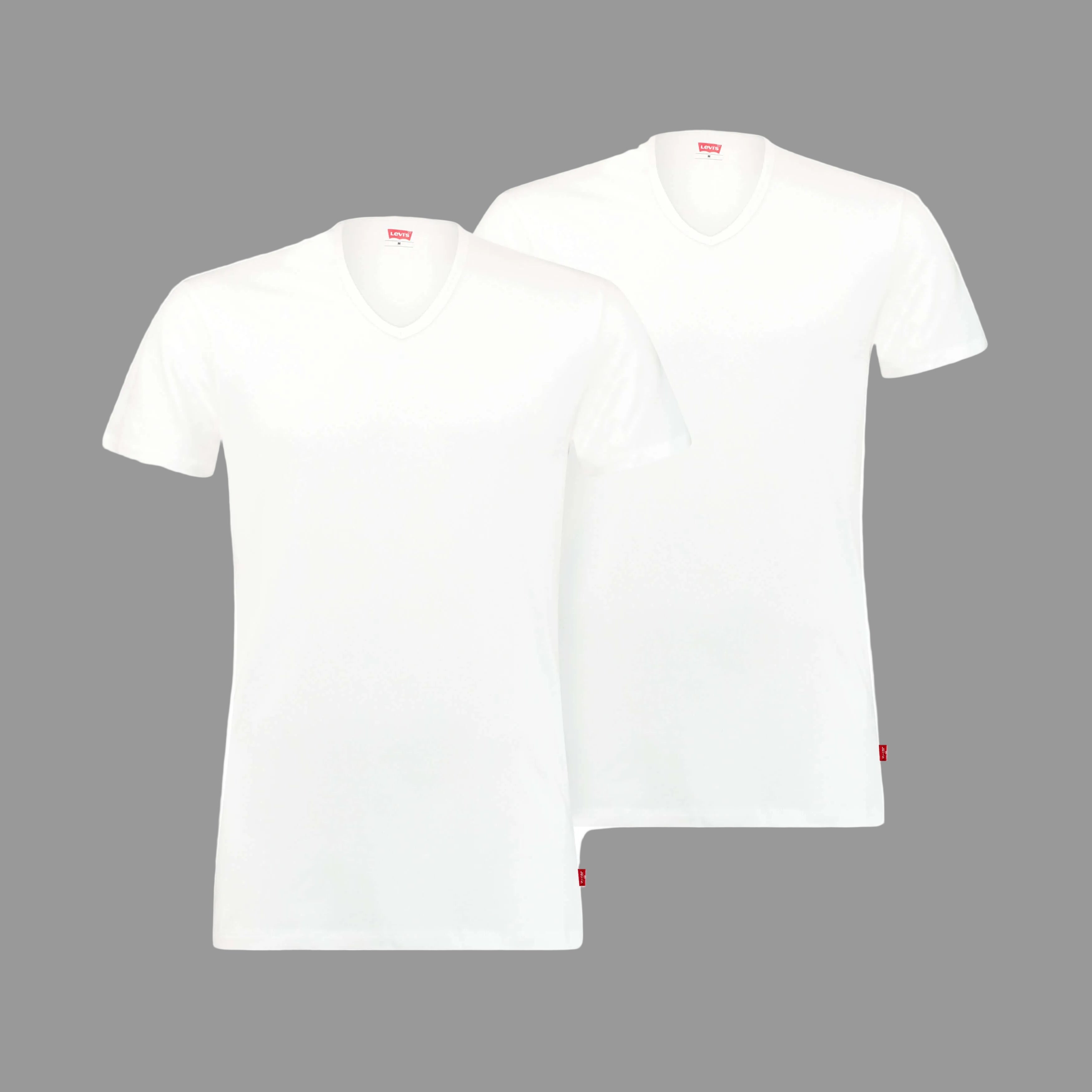 Two white t-shirts with red labels on a white background