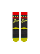 Stance Grinch Sweater black socks reverse view showing yellow Grinch lettering, festive tree pattern and red cuffs