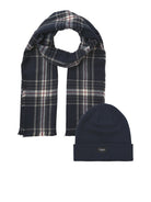 Navy plaid scarf and navy beanie on a white background