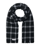 Black and white plaid scarf on a white background