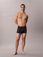 Calvin Klein Ultra Soft Modal 3-pack trunks in Dark Sapphire Dusty Orchid Grey Heather – model front view