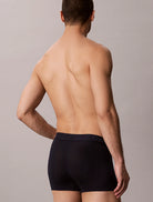 Calvin Klein Ultra Soft Modal 3-pack trunks in Dark Sapphire Dusty Orchid Grey Heather – model rear or alternate view