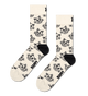 A pair of crew socks in cream with a black cartoon cat face pattern and the word 'HAPPY' printed near the foot, shown on a plain white background.