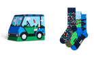 A golf-themed product display featuring a blue and green golf cart box on the left and a set of four patterned crew socks on the right, all on a plain white background.