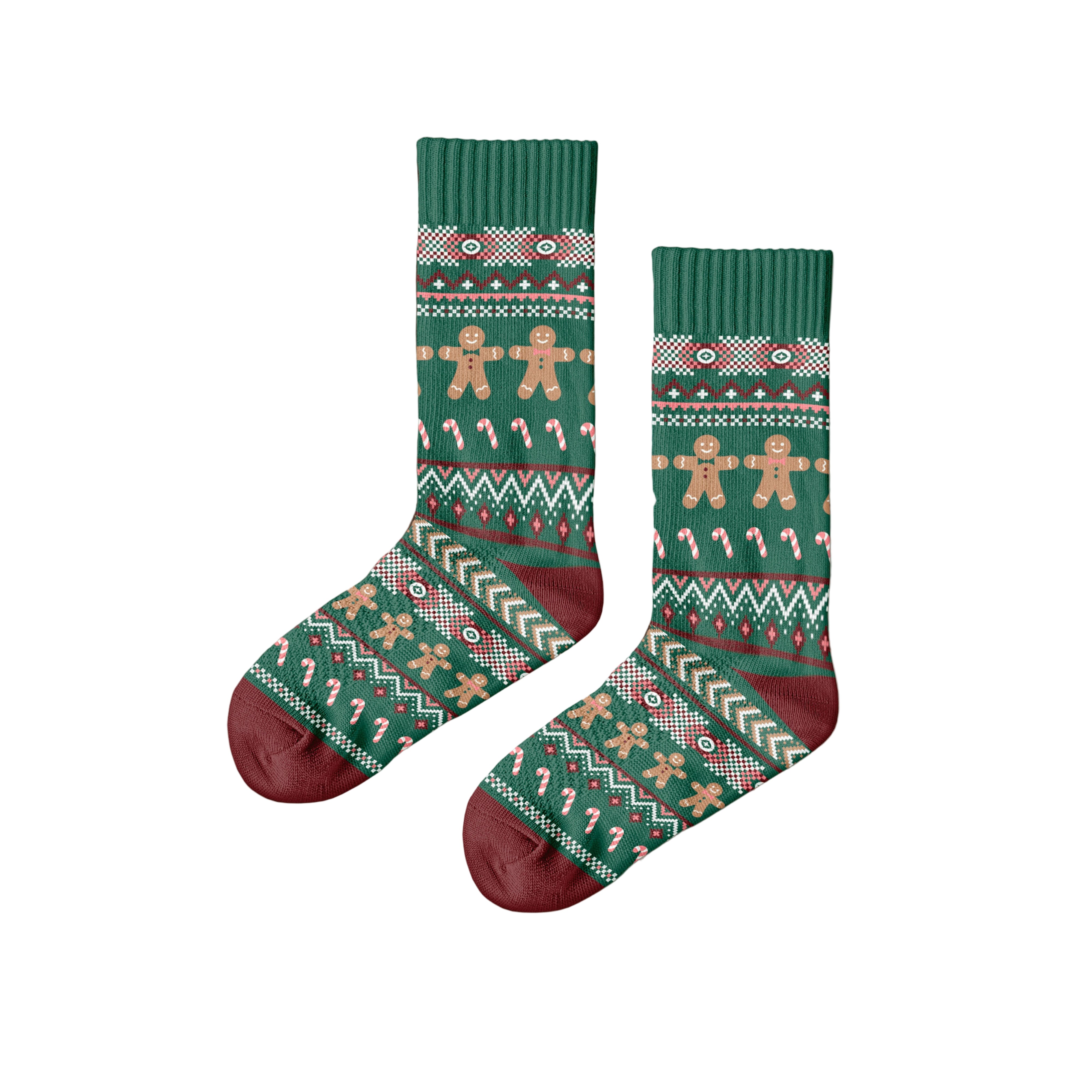 Green Christmas-themed socks with gingerbread design on a wooden surface, featuring the brand 'Polar Star'.