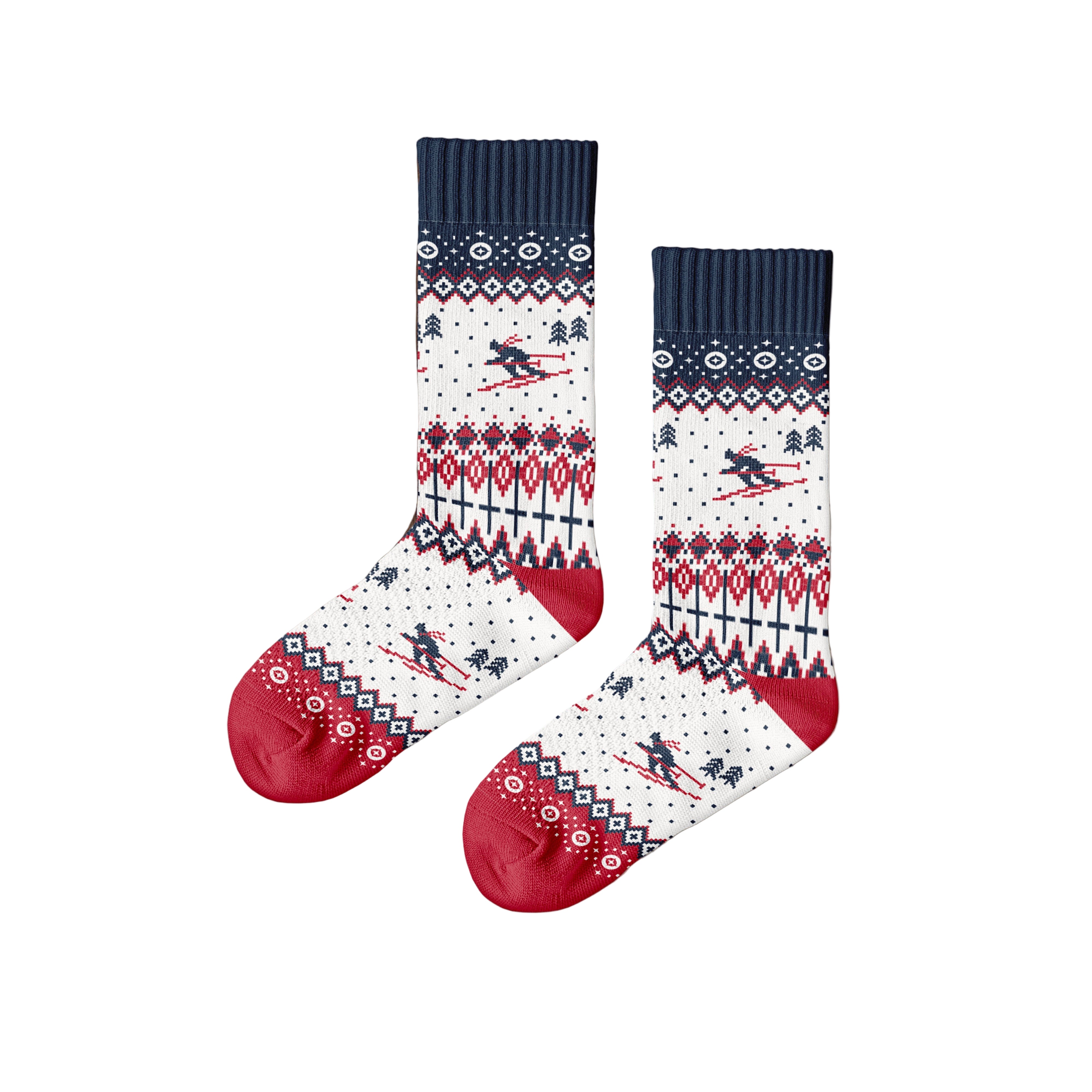 Pair of socks with skiing design on a wooden surface, featuring the brand 'Polar Star'.