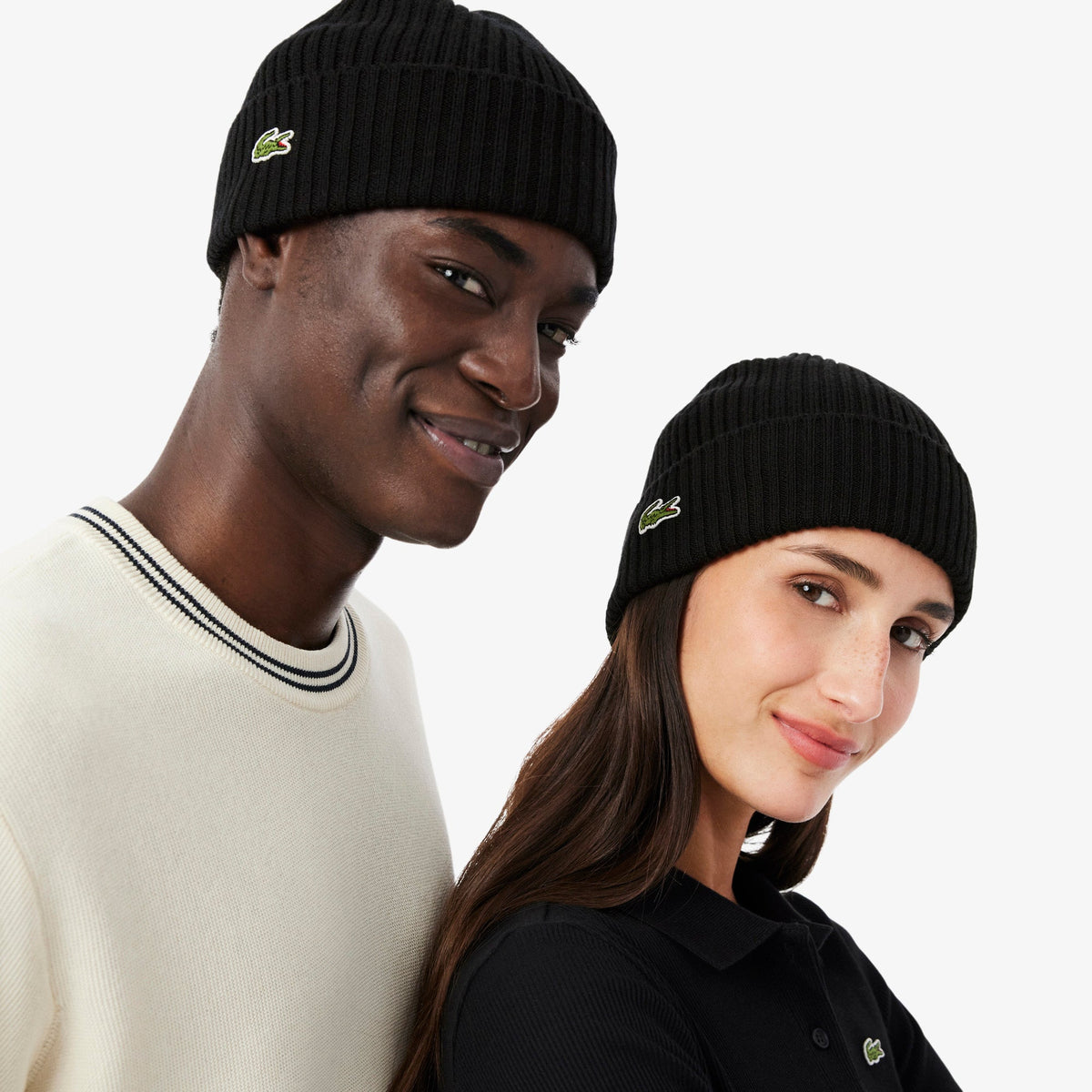 Model wearing Lacoste black rib knit wool beanie hat