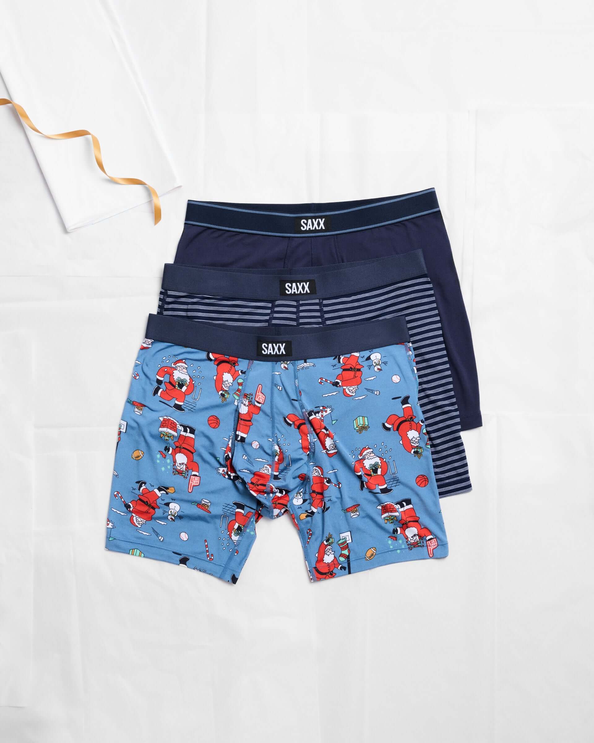 SAXX Daytripper 3 Pack Boxer Briefs – Holiday Edition Santathalon / Stripe / Navy