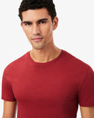 Lacoste TH2273 RFX 3-Pack Slim Fit Cotton Crew Neck T-Shirts – model wearing the carmine red slim-fit crew neck T-shirt