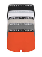 Set of Guess boxer briefs in black, gray, and orange with brand logo on waistband.