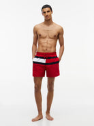 Tommy Hilfiger men’s red flag mid-length recycled nylon swim shorts