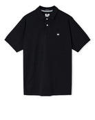 Black polo shirt with a small logo on a white background