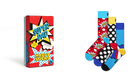 Happy Socks 'Super Dad' gift set featuring a red comic-book style box with 'SUPER DAD' and 'HAPPY SOCKS' text, alongside three colorful patterned socks with polka dots, stars, and comic burst designs on a white background.