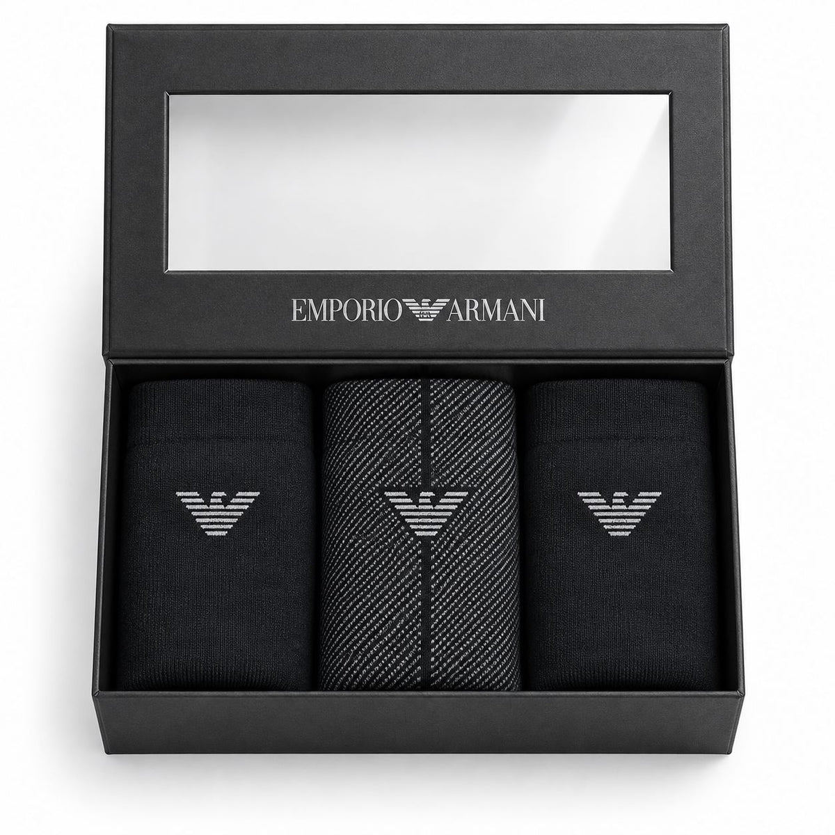 Emporio Armani men's gift set containing three pairs of black dress socks in a black presentation box with a clear window and the brand logo.