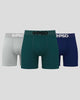 Three pairs of PSD boxer briefs in gray, green, and blue on a light gray background.